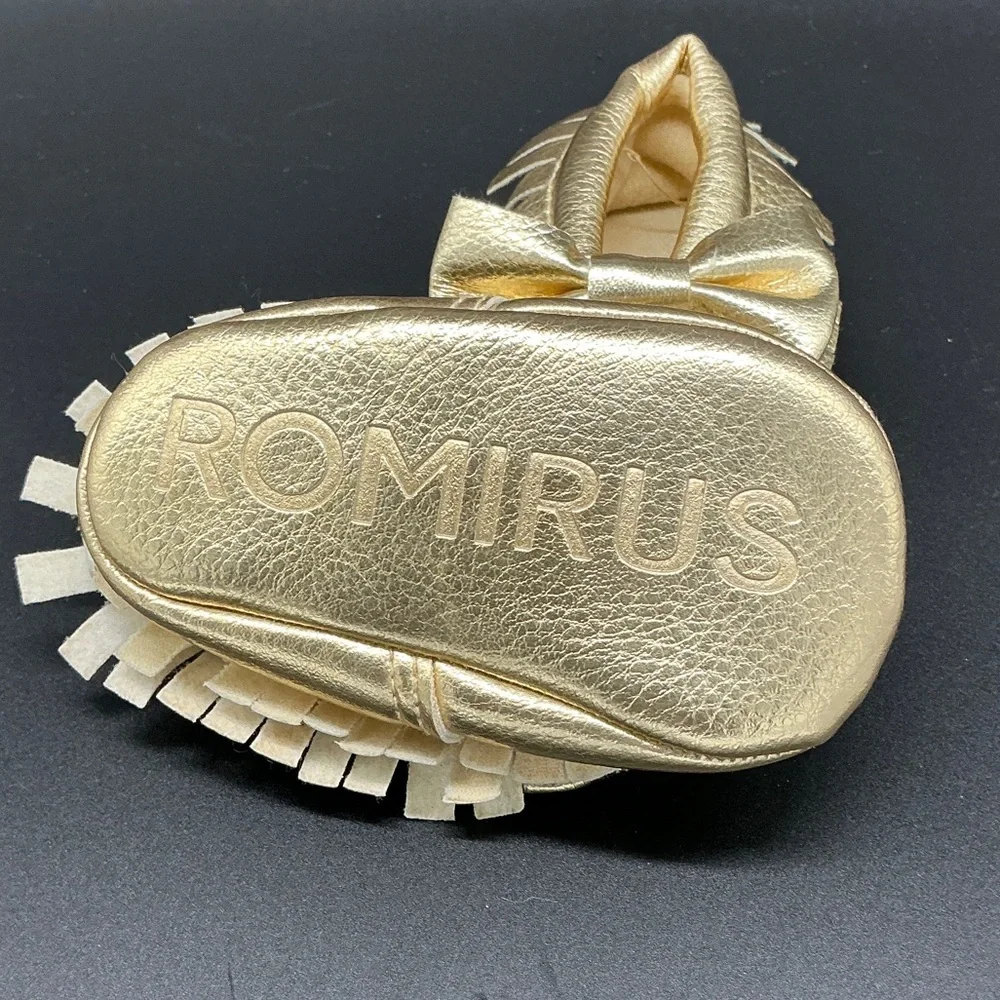 Romirus Metallic Gold Bow Fringe Moccasins